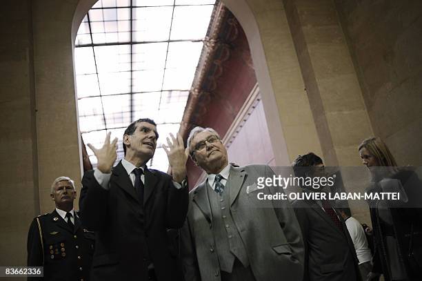 Prince Henrik of Denmark chats with the president of the Louvres Museum Henri Loyrette on November 12, 2008 in Paris, after he inaugurated the...