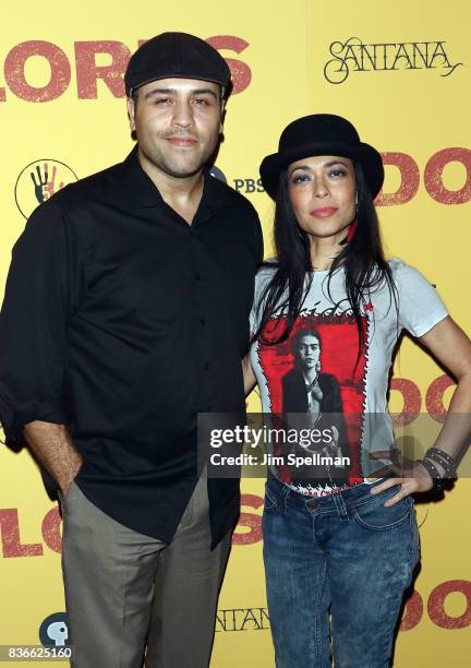 Gilberto Velazquez and Poet Caridad De la Luz attend the "Dolores" New York premiere at The Metrograph on August 21, 2017 in New York City.