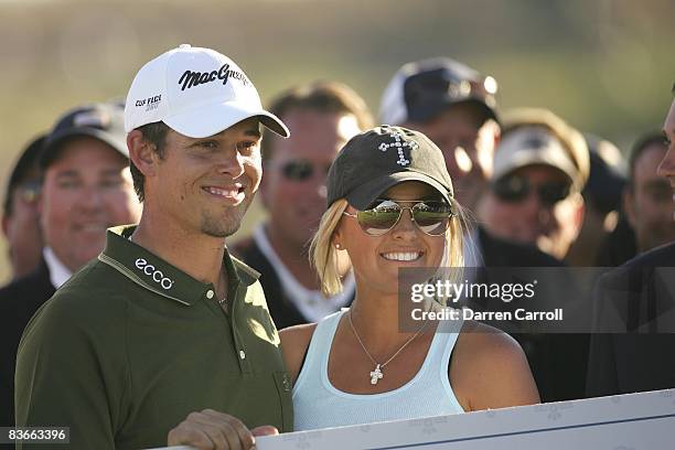 Closeup of Aaron Baddeley victorious with wife Richelle after winning tournament on Sunday at TPC Scottsdale. Scottsdale, AZ 2/4/2007 CREDIT: Darren...