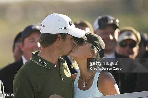 Closeup of Aaron Baddeley victorious, kissing wife Richelle after winning tournament on Sunday at TPC Scottsdale. Scottsdale, AZ 2/4/2007 CREDIT:...