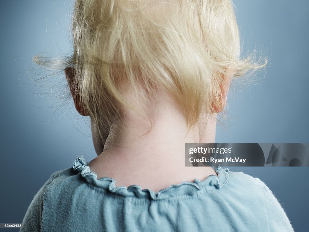 Back of the head of an 11 month old baby girl.