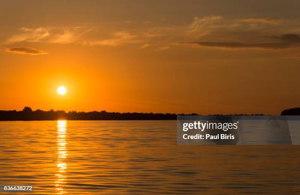 a beautiful sunset in the danube delta, romania - tulcea foto e immagini stock