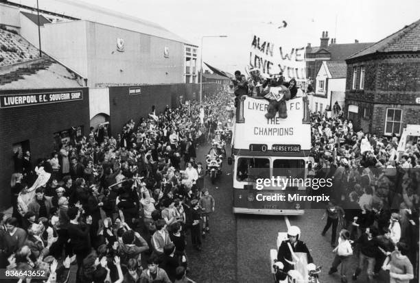 The Liverpool FC Tour Bus passes Anfield Football Club in Walton, Liverpool as the players enjoy a parade in their honour after winning the 1981...