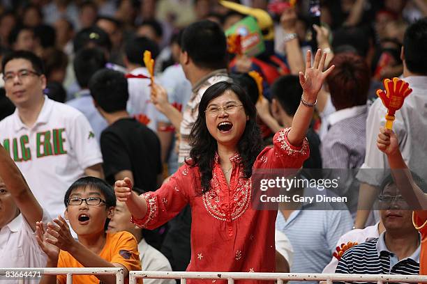 Fans celebrate during the game between the Milwaukee Bucks and the Golden State Warriors at 2008 NBA China Games on October 15, 2008 at the Guangzhou...