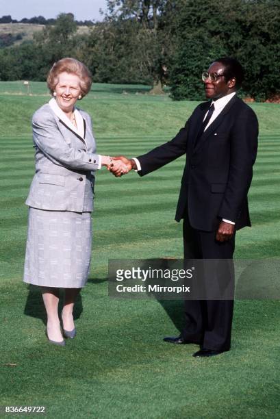 Margaret Thatcher British Prime Minister - Oct 1988 with President Robert Mugabe.
