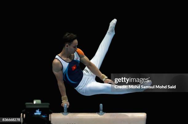 Dinh Phuong Thanh of Vietnam in action during Men artistic gymnastic pommel horse event final during the 29th Southeast Asian Games on August 22,...