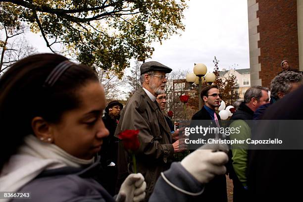 Large crowd of same-sex marriage supporters and media watch as Michael Miller and Ross Zachs marry on the West Hartford Town Hall after receiving...