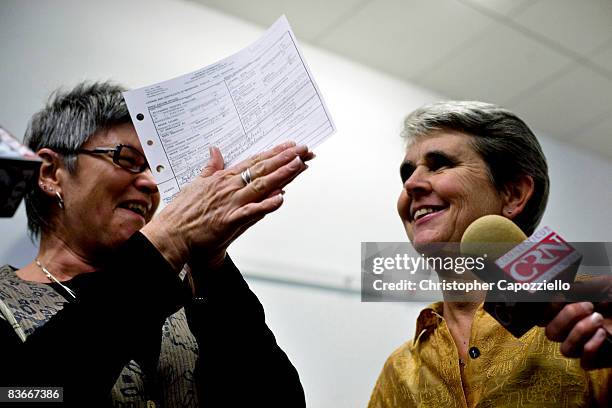 Jody Mock and Beth Kerrigan take questions from the media at West Hartford Town Hall after receiving their marriage license November 12, 2008 in West...