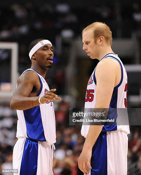 Ricky Davis talks with teammate Chris Kaman of the Los Angeles Clippers during the game against the Houston Rockets at Staples Center on November 7,...