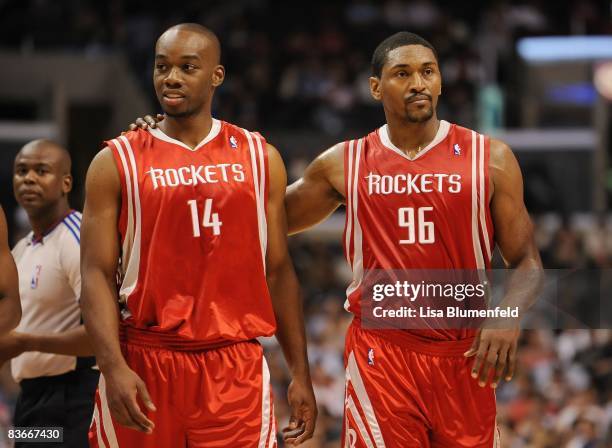 Carl Landry and teammate Ron Artest of the Houston Rockets walk upcourt during the game against the Los Angeles Clippers at Staples Center on...