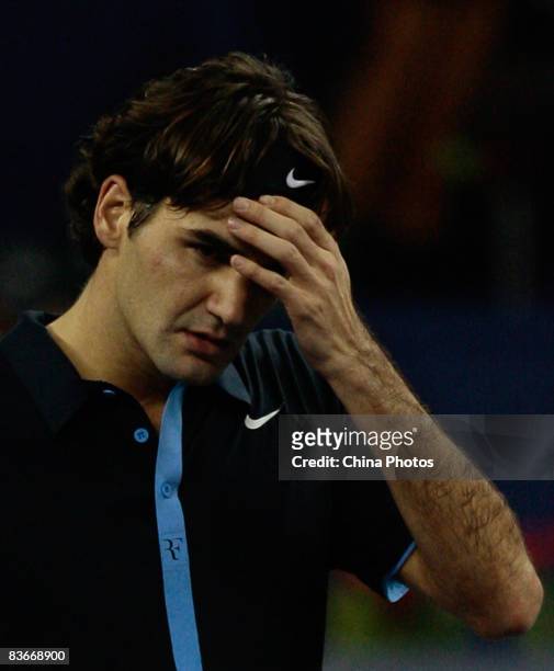 Roger Federer of Switzerland reacts during his round robin match against Radek Stepanek of the Czech Republic in the Tennis Masters Cup held at Qi...