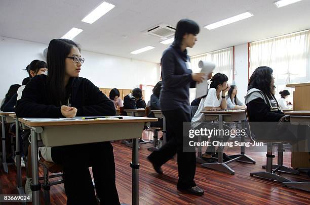 South Korean students take their College Scholastic Ability Test at a school on November 13, 2008 in Seoul, South Korea. More than 580,000 high...