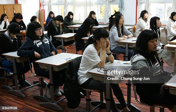 South Korean students take their College Scholastic Ability Test at a school on November 13, 2008 in Seoul, South Korea. More than 580,000 high...