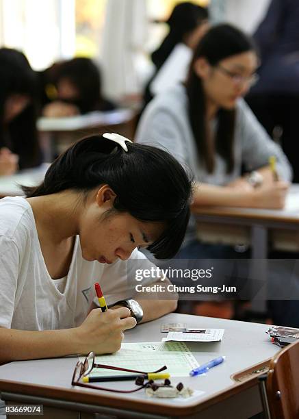 South Korean students take their College Scholastic Ability Test at a school on November 13, 2008 in Seoul, South Korea. More than 580,000 high...