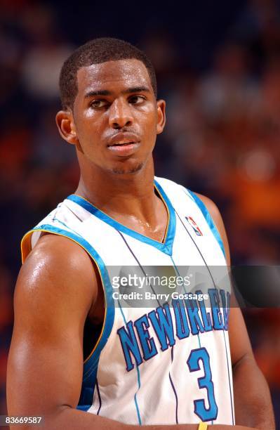 Chris Paul of the New Orleans Hornets looks on during the game against the Phoenix Suns at US Airways Center on October 30, 2008 in Phoenix, Arizona....