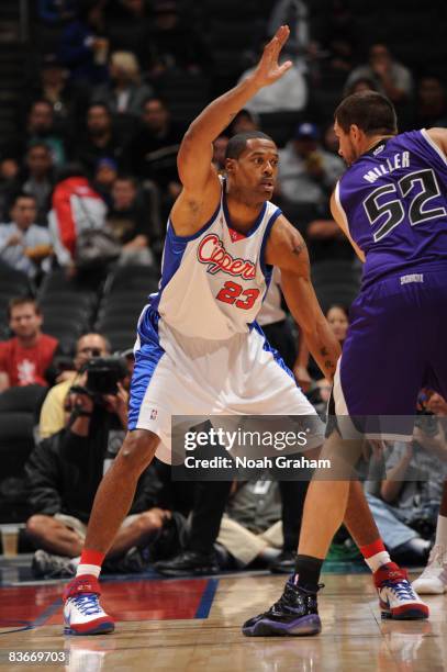 Marcus Camby of the Los Angeles Clippers guards Brad Miller of the Sacramento Kings during their game at Staples Center on November 12, 2008 in Los...