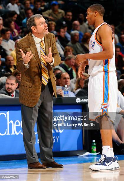 Head coach P.J. Carlesimo of the Oklahoma City Thunder talks to Russell Westbrook during a game against the Orlando Magic at the Ford Center November...