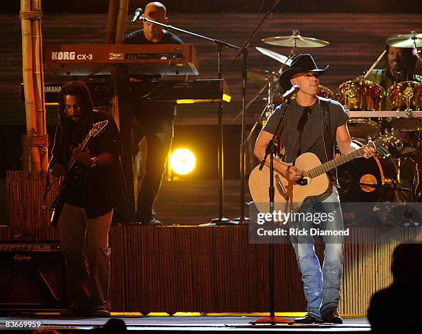 Musician Kenny Chesney performs "Everybody Wants to Go to Heaven" and "Three Little Birds" with the Wailers on stage during the 42nd Annual CMA...
