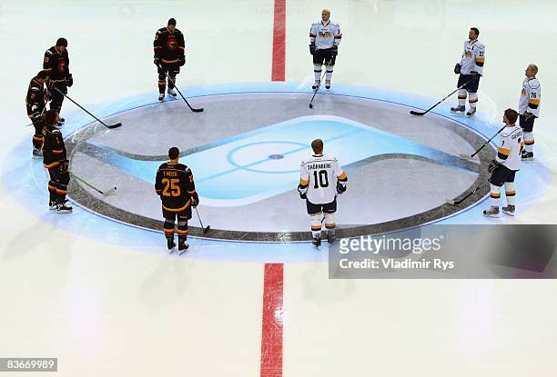 Teams line up for the anthems prior to the IIHF Champions Hockey League game between SC Bern and HV71 Jonkoping at the PostFinance-Arena on November...