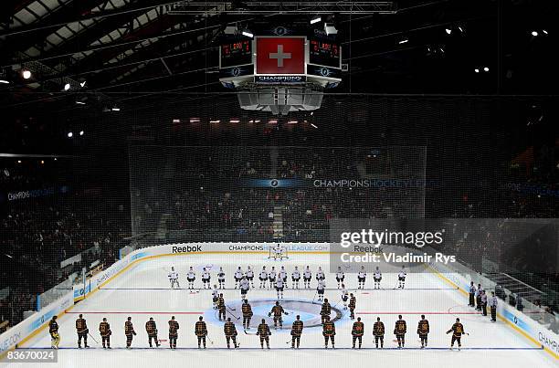 Teams line up for the anthems prior to the IIHF Champions Hockey League game between SC Bern and HV71 Jonkoping at the PostFinance-Arena on November...