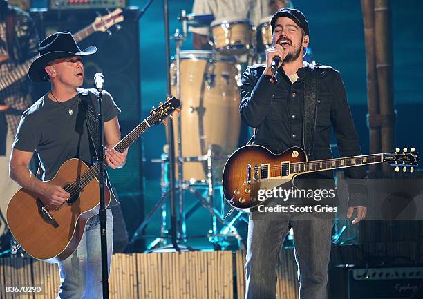 Singer Kenny Chesney performs with The Wailers on stage during the 42nd Annual CMA Awards at the Sommet Center on November 12, 2008 in Nashville,...