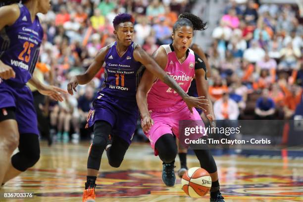Alyssa Thomas of the Connecticut Sun is fouled by Danielle Robinson of the Phoenix Mercury during the Connecticut Sun Vs Phoenix Mercury, WNBA...