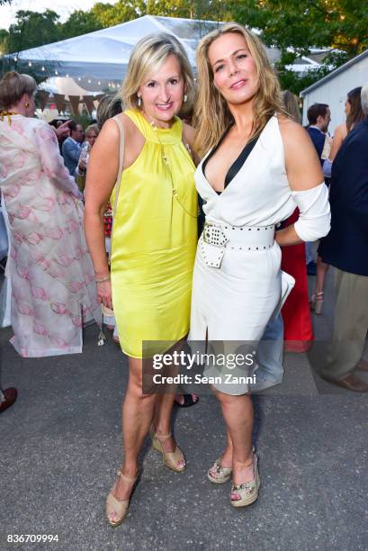 Adriana Pidwer-Betsky and Erin Gibbs attend ARF's Bow Wow Meow Ball at ARF Adoption Center on August 19, 2017 in Wainscott, NY.