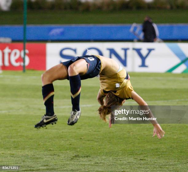 Kristie Mewis captain of the USA does a cartwheel as she celebrates victory during the FIFA U17 Women`s World Cup Semi Final match between Germany...