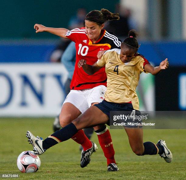 Crystal Dunn of USA battles for the ball with Dzsenifer Marozsan during the FIFA U17 Women`s World Cup Semi Final match between Germany and the USA...