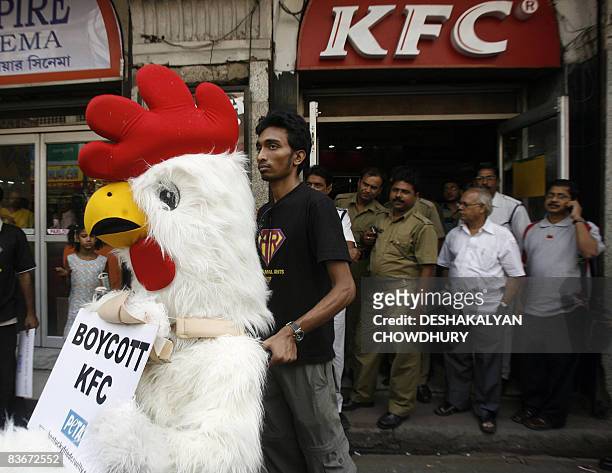 50 Animal Rights Activists Protest Against Chicken Fast Food Chain Photos  and Premium High Res Pictures - Getty Images