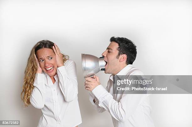 Shouting In Ear Shouting In Ear Photos and Premium High Res Pictures - Getty Images
