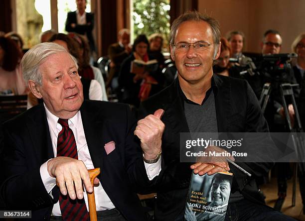 Former German chancellor Helmut Schmidt speaks to Reinhold Beckmann during the book presentation of his wife Loki Schmidt at the Heinrich Heine House...