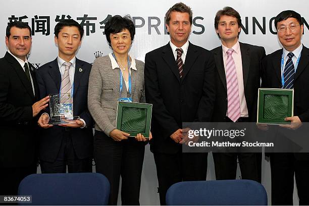 Michael Luevano, Leon Sun, Sun Jinfang, CEO of ATP International Brad Drewett, Arnaud Boetsch and Qiu Weichang pose for photographers after a press...