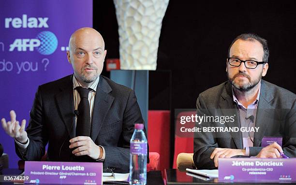 French news agency AFP chairman Pierre Louette and French lifestyle news agency Relaxnews CEO Jerome Doncieux give a press conference during the...