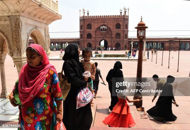 Indian Muslims visit the Jama Masjid mosque in New Delhi on August 22, 2017. India's top court on August 22 banned a controversial Islamic practice...