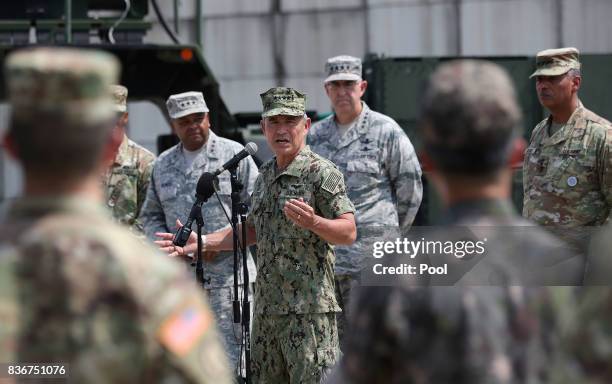 Pacific Command Commander Adm. Harry Harris answers a reporter's question as U.S. And South Korean soldiers listen during a press conference as Lt....