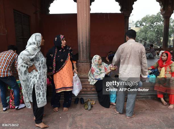 An Indian Muslim family visits the Jama Masjid mosque in New Delhi on August 22, 2017. India's top court on August 22 banned a controversial Islamic...