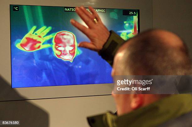 Colin Dealey stands in front of a thermal imaging camera in a giant fridge, which simulates arctic conditions, to test the insulation of his coat in...