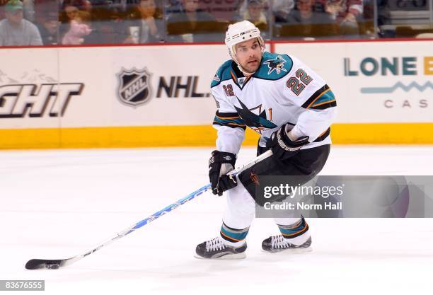 Dan Boyle of the San Jose Sharks looks to pass the puck against the Phoenix Coyotes on November 9, 2008 at Jobing.com Arena in Glendale, Arizona.