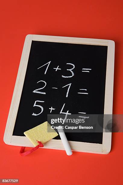 a chalkboard with math problems written on it - subtraktion bildbanksfoton och bilder