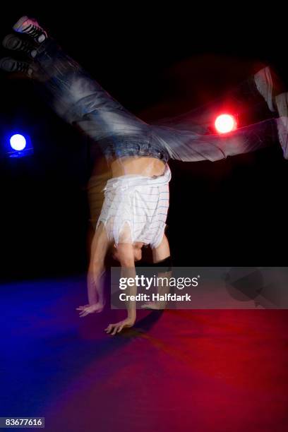 a b-boy doing a flare breakdance move - stroboscopic image stock pictures, royalty-free photos & images