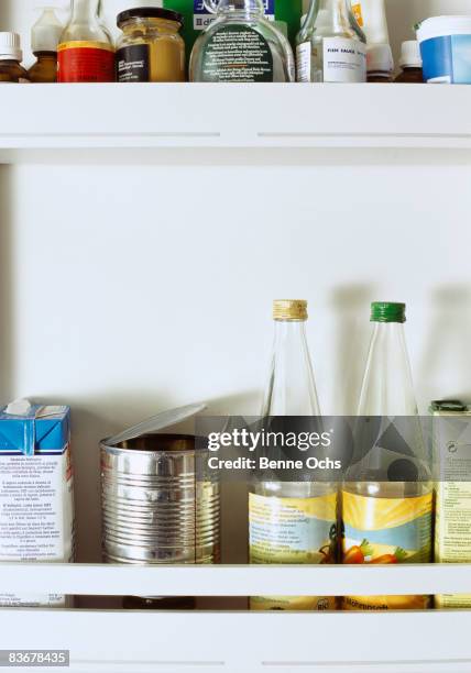 inside refrigerator door full of condiments - condiment stock pictures, royalty-free photos & images