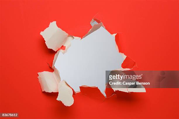 a hole in a wall - broken wall stock pictures, royalty-free photos & images