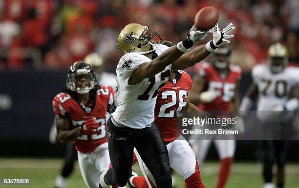 Marques Colston of the New Orleans Saints can't pull in this pass against the Atlanta Falcons at Georgia Dome on November 9, 2008 in Atlanta, Georgia.
