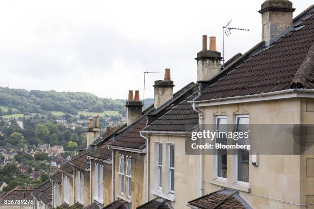 Row of terraced houses sit on a suburban street in Bath, U.K. On Monday, Aug. 21, 2017. U.K. Property prices stagnated in July as a slump in London...