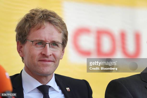 Daniel Guenther, lawmaker of the Christian Democrat Union and state premier of Schleswig-Holstein state, looks on during an election campaign stop in...