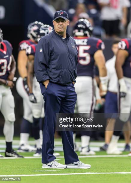 Houston Texans head coach Bill O'Brien watches warmups during the NFL preseason game between the New England Patriots and Houston Texans on August...