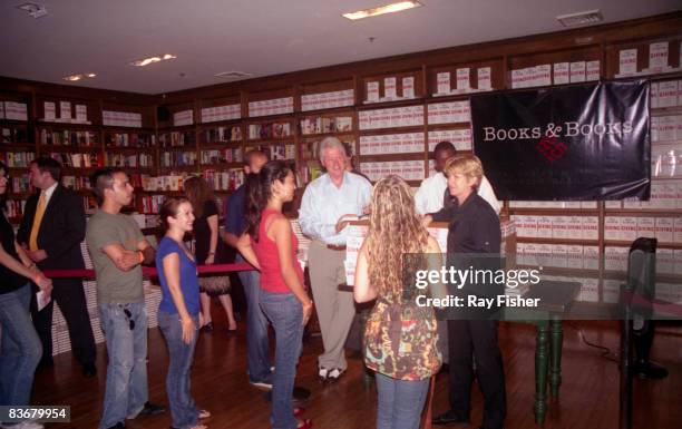 Former US President Bill Clinton at a book signing session for his new book 'Giving,' at an independent bookstore 'Books & Books,' Coral Gables,...