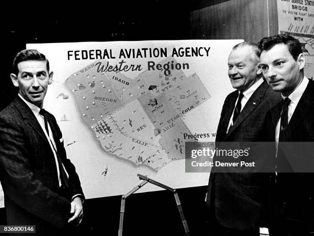 Officers Of National Association Of Air Traffic Specialists Check Map At left is A.D. Woodlin, Joplin, Mo., president. At right are Walter L. Hart,...