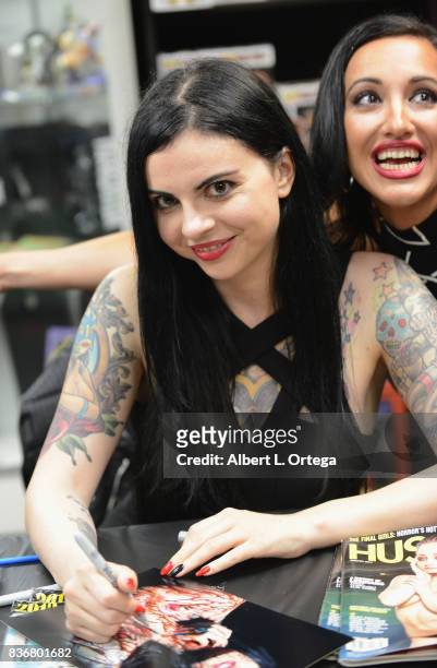 Model Pandie Suicide participates in the "Hotness Of Horror" - A Special Scream Queen Signing Event held at Dark Delicacies Bookstore on August 21,...